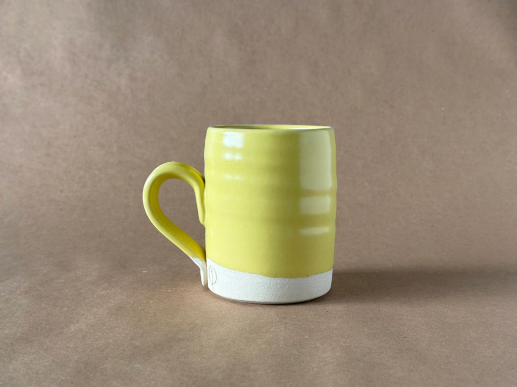 Yellow Mug with a brown backdrop