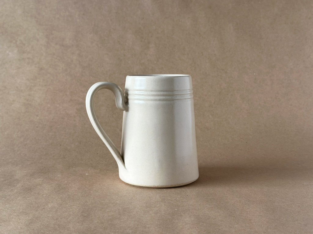 Linen Tankard Mug with a Brown Backdrop